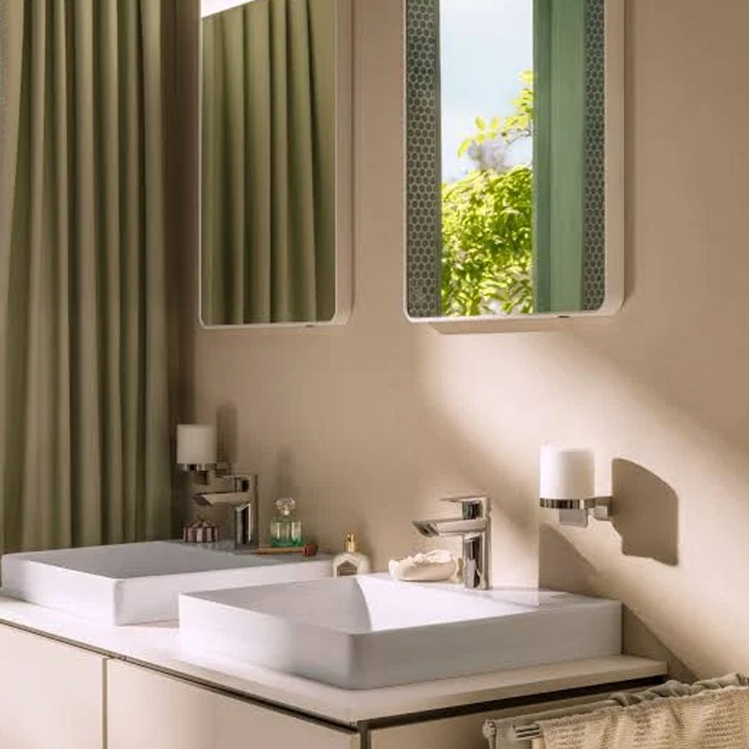 Lifestyle image of the Hansgrohe AddStoris S Liquid Soap Dispenser in Chrome. Supplied by Deluxe Bathrooms.