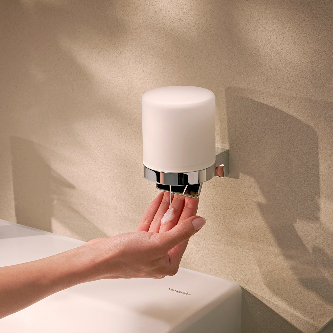Pumping the Hansgrohe AddStoris S Liquid Soap Dispenser in Chrome. Supplied by Deluxe Bathrooms.