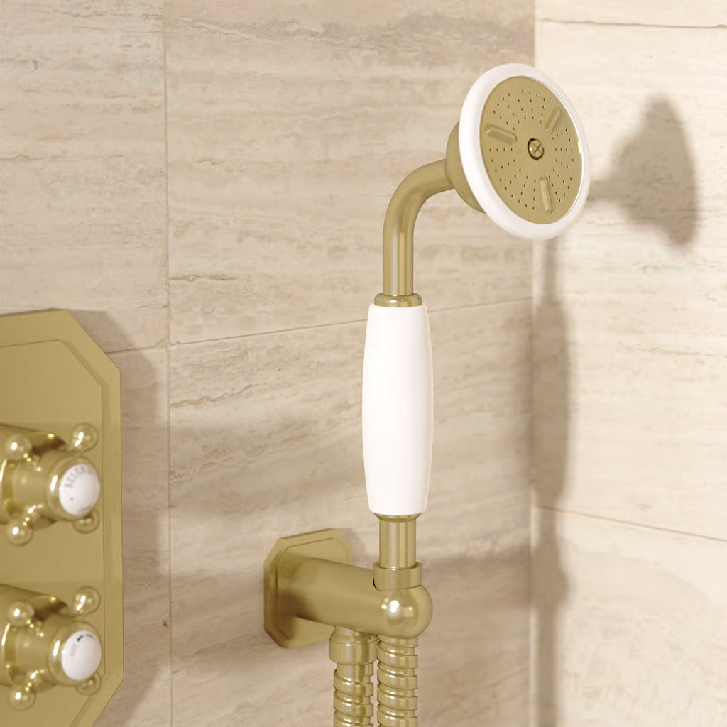 Belgravia wall-mounted shower handset in brushed brass, supplied by Deluxe Bathrooms Ireland.