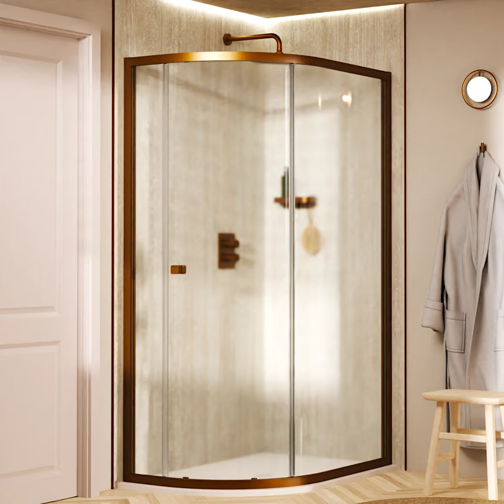Crosswater Clear 6 shower door offset quadrant enclosure with clear glass panels and a brushed bronze finished frame, supplied by Deluxe Bathrooms.