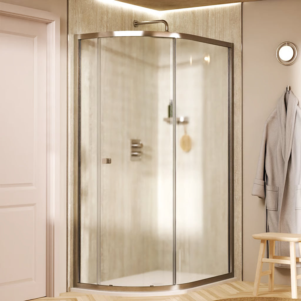 Crosswater Clear 6 shower door offset quadrant enclosure with clear glass panels and a brushed nickel finished frame, supplied by Deluxe Bathrooms.