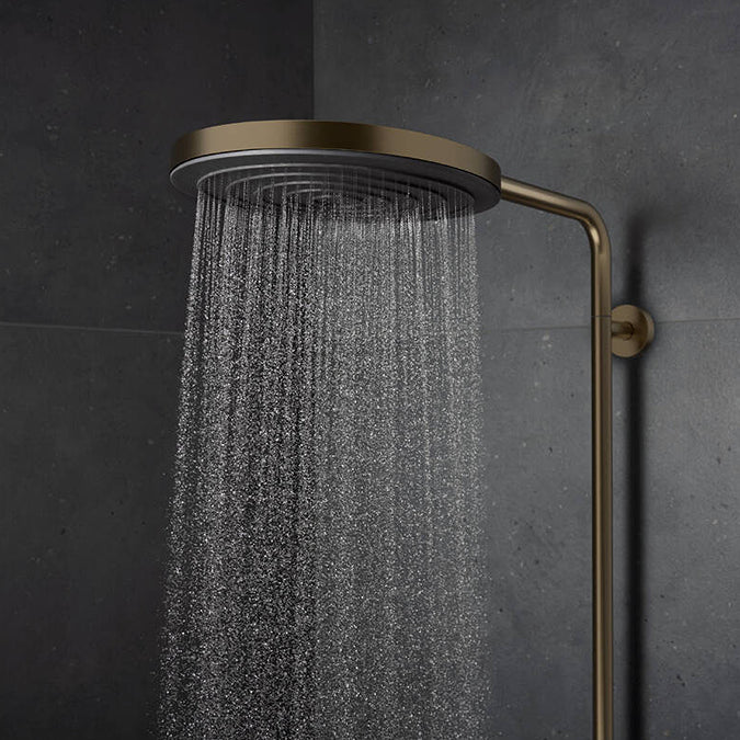 Water flowing from overhead of the Hansgrohe Pulsify S Puro 1-Jet Shower in brushed bronze finish, supplied by Deluxe Bathrooms.
