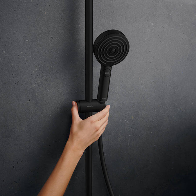Adjustable handset height of the Hansgrohe Pulsify S Puro Shower Set, in matt black, supplied by Deluxe Bathrooms.