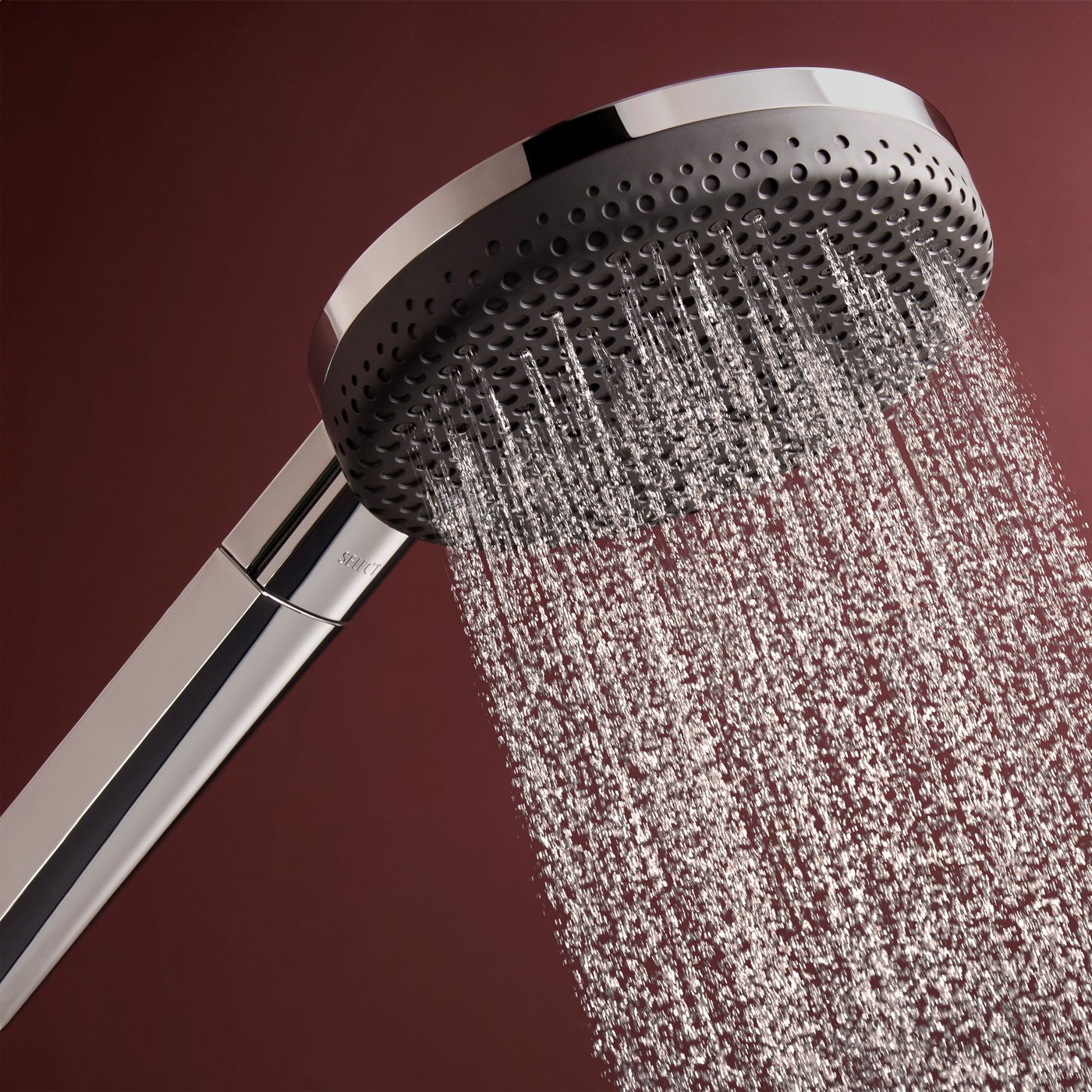 Water jet flow from the shower head of the Hansgrohe Raindance Alive shower system, supplied by Deluxe Bathrooms.