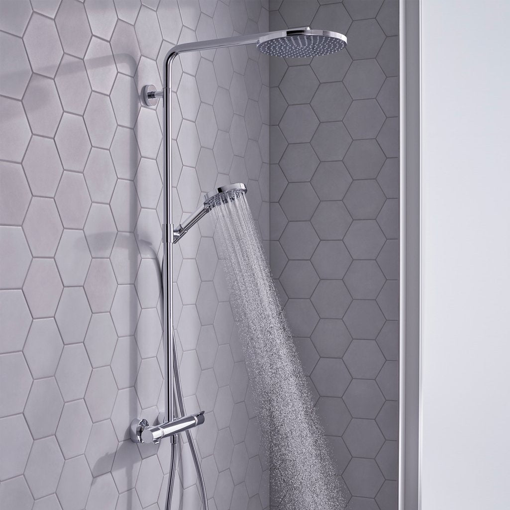 Extra fine, enveloping spray flowing from handset of Hansgrohe Raindance Select 1-Jet Shower system - in chrome finish, supplied by Deluxe Bathrooms.