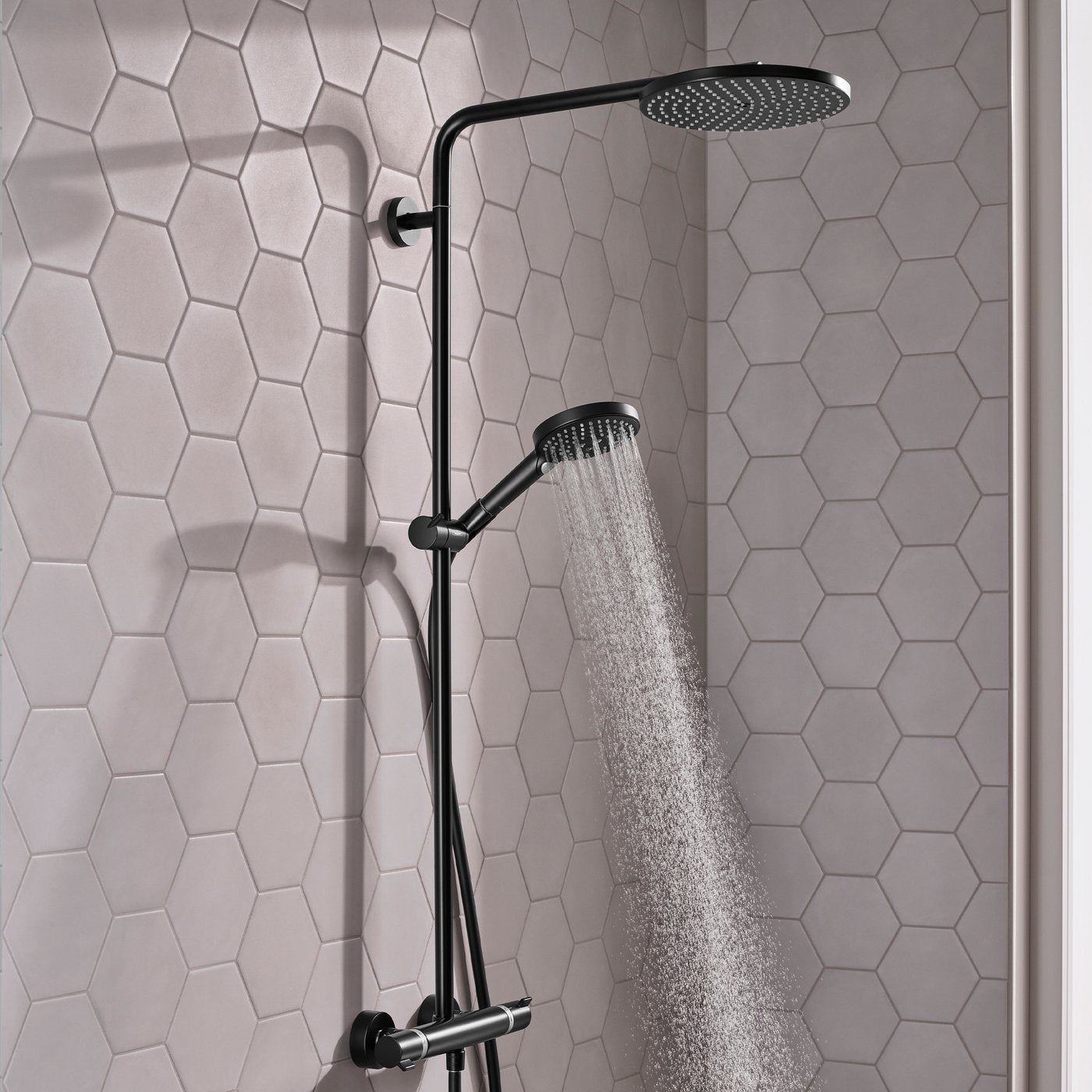 Extra fine, enveloping spray of water from handset of Hansgrohe Raindance Select 1-Jet Shower system - in matt black, supplied by Deluxe Bathrooms.