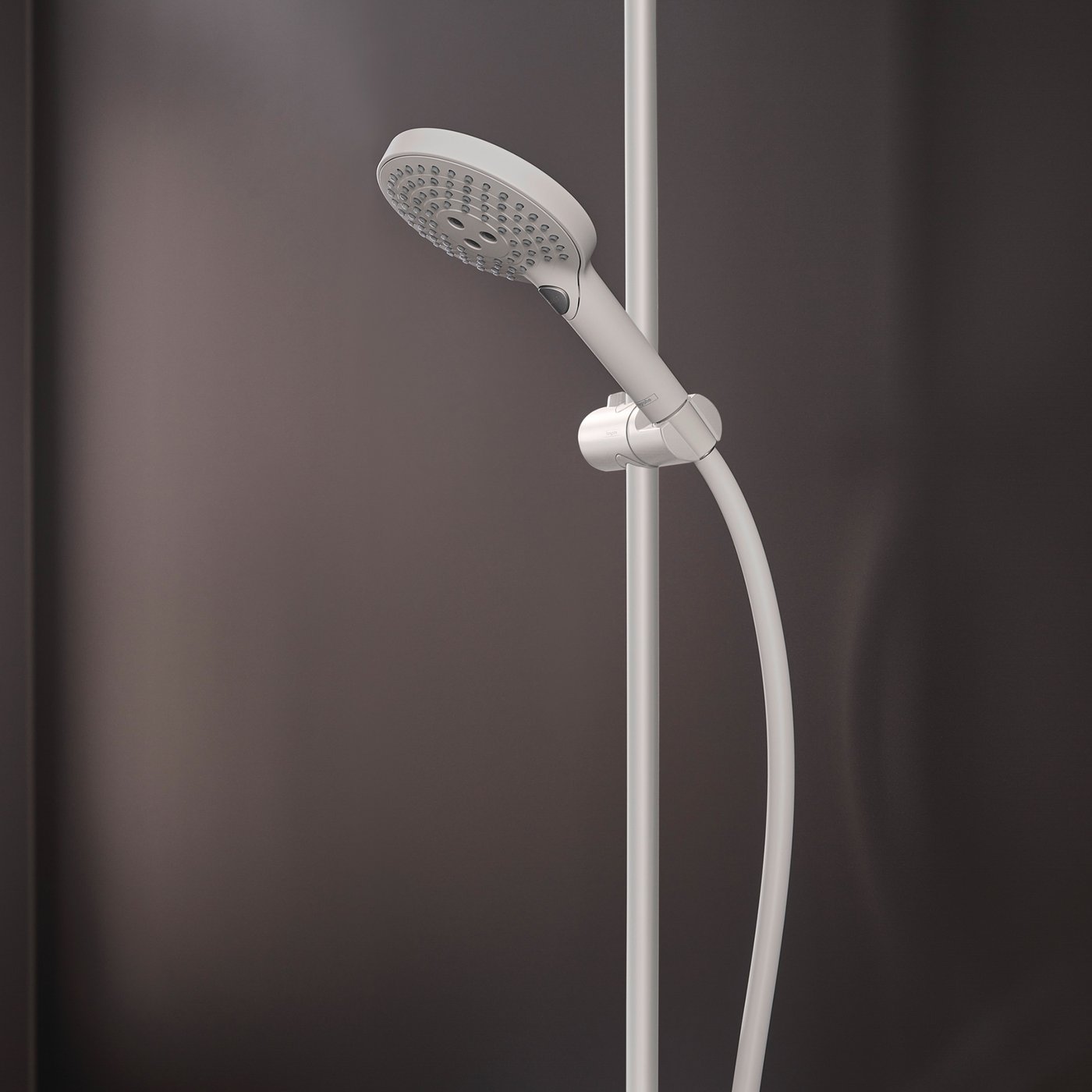 Handset and hose of Hansgrohe Raindance Select 1-Jet Shower system - in matt white, supplied by Deluxe Bathrooms.