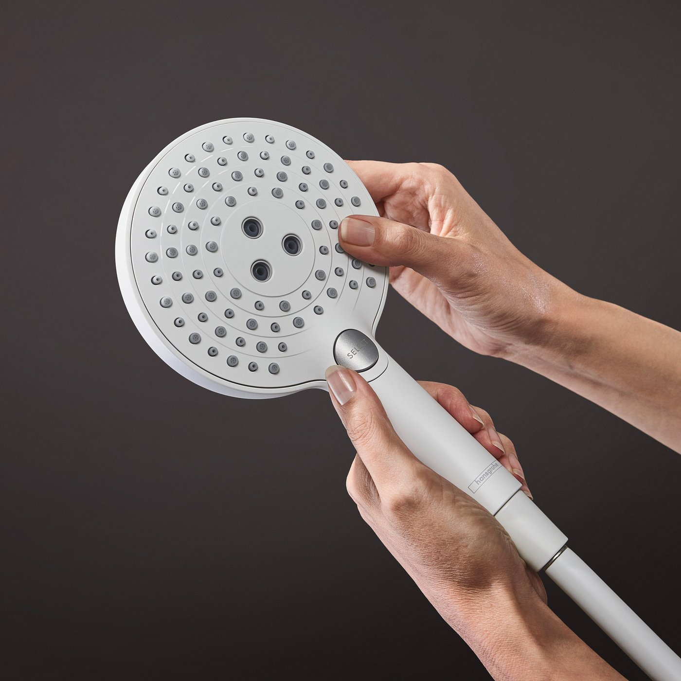 Handset shower water jet nozzles view of a Hansgrohe Shower supplied by Deluxe Bathrooms.