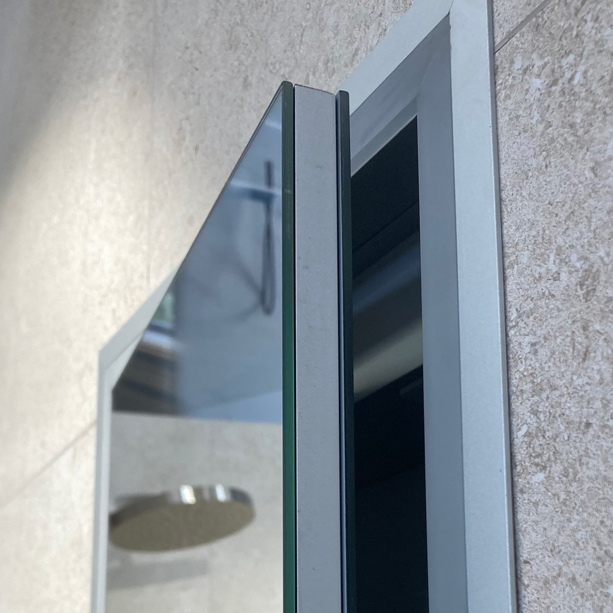 Hib Vanquish 30 Wall Mounted Recessed Cabinet with door slightly open, showing door edge profile.
