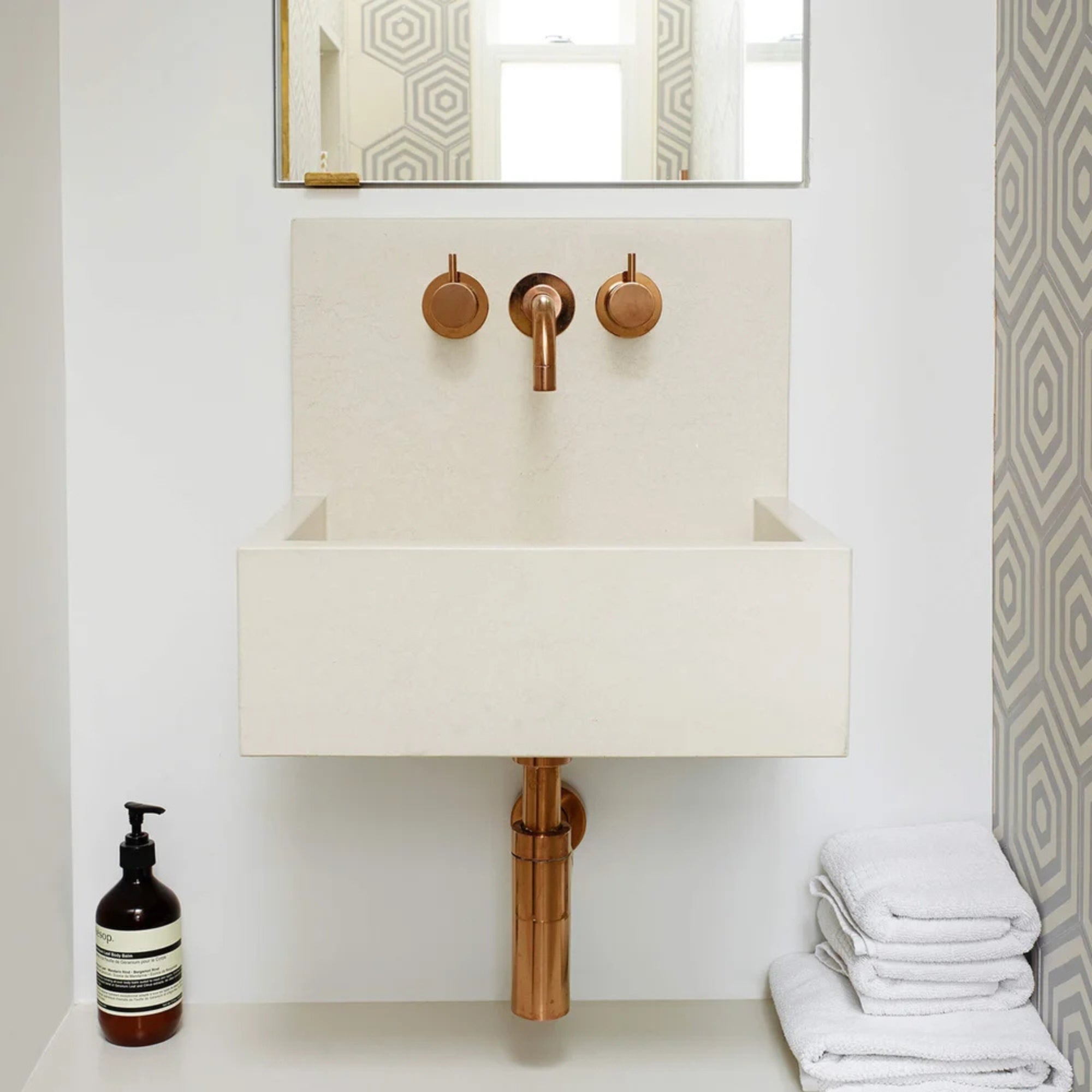 kast kern wall-hung concrete basin with splashback