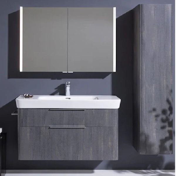 Lifestyle image of the Laufen Moderna wall-hung vanity unit and washbasin in dark oak colour.