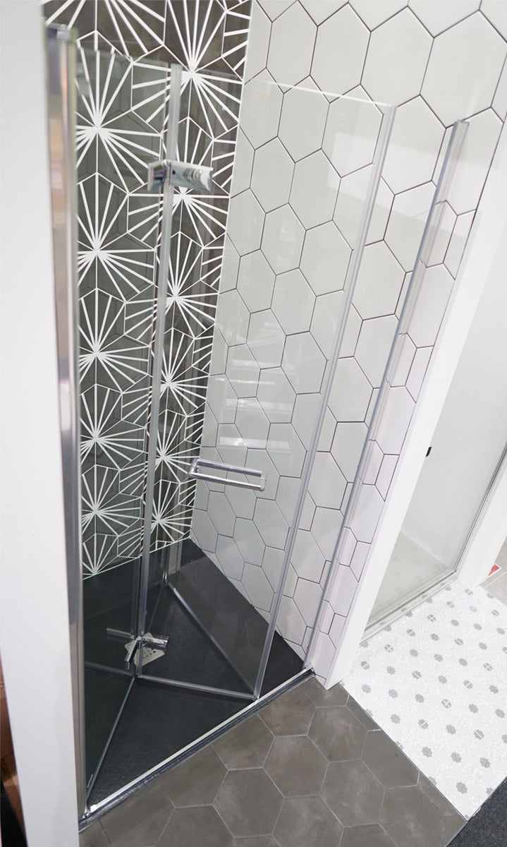 Merlyn 8 Series Frameless Hinged Bi-Fold Shower Door In Recess