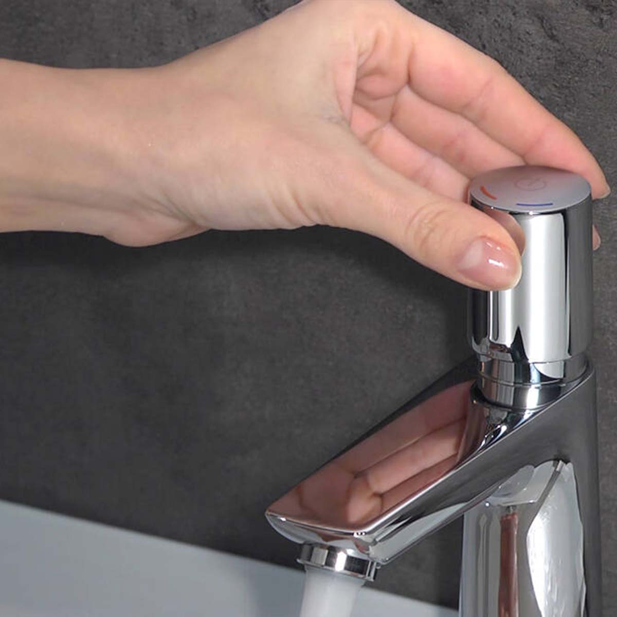 Hansgrohe talis select e single lever basin mixer with pop up waste chrome close up