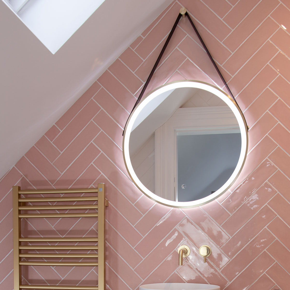 HiB Solstice Round LED Mirror With Brushed Brass Frame and Decorative Strap