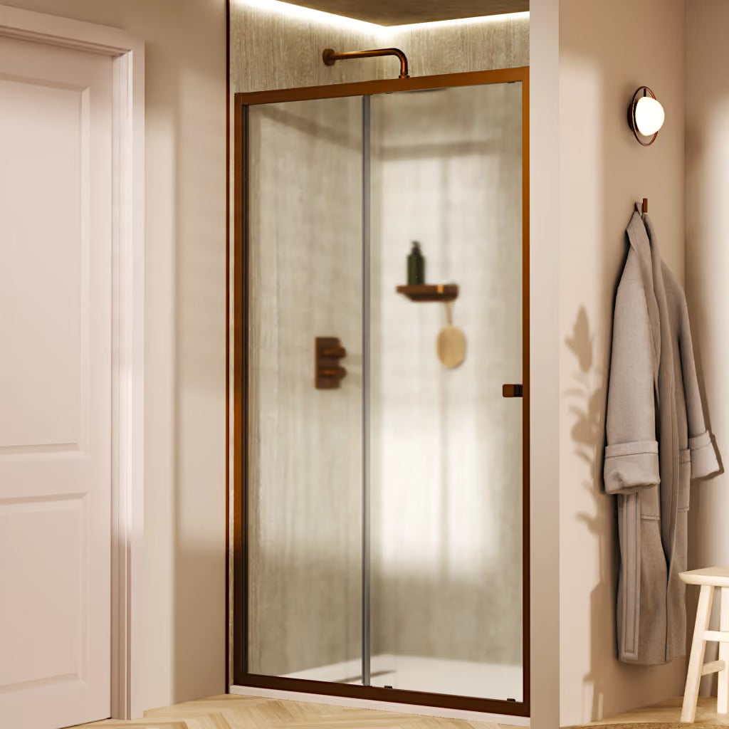 Crosswater Clear 6 slide shower door in brushed bronze finish, supplied by Deluxe Bathrooms.