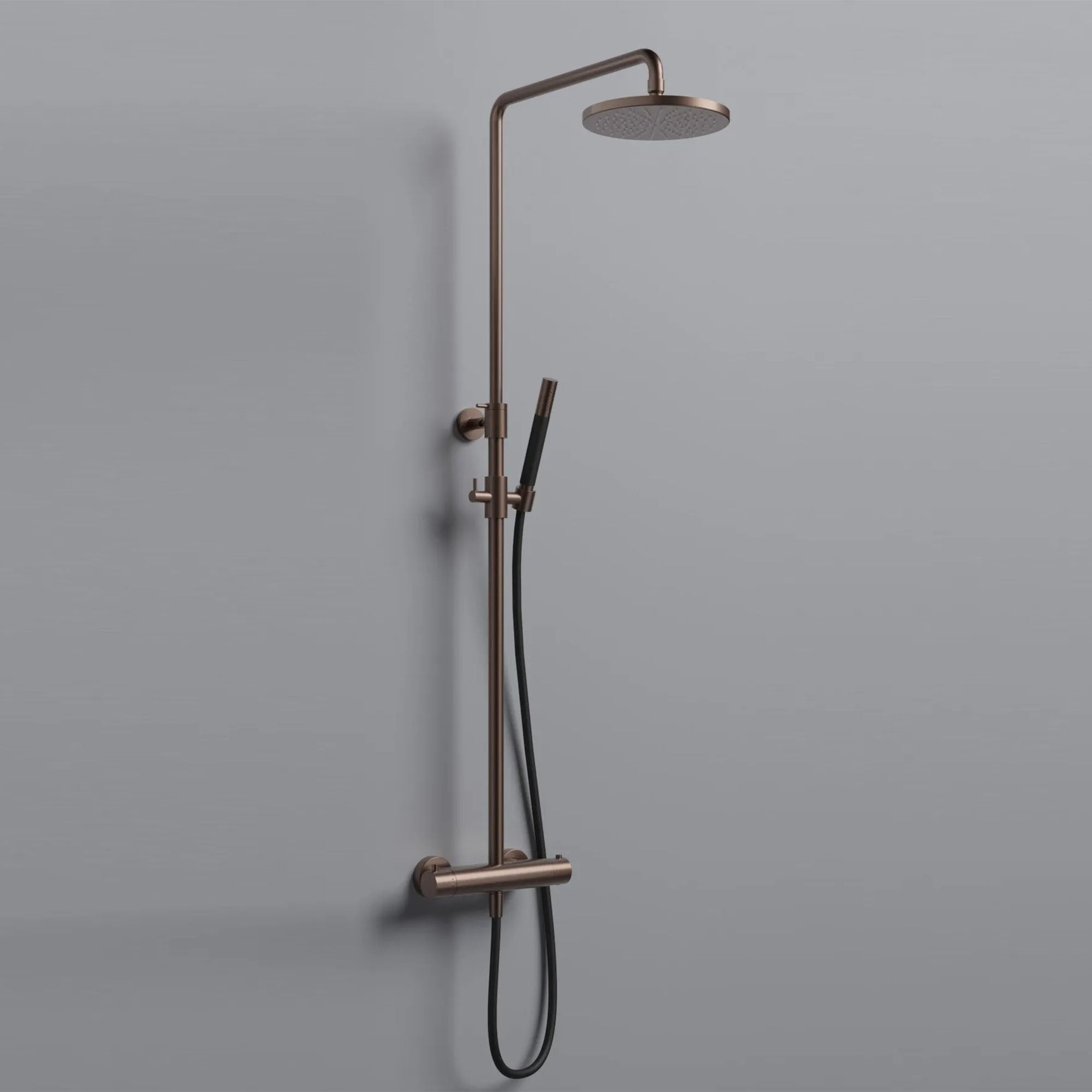 cobber exposed thermostatic rigid riser shower with pencil handset brushed copper pvd