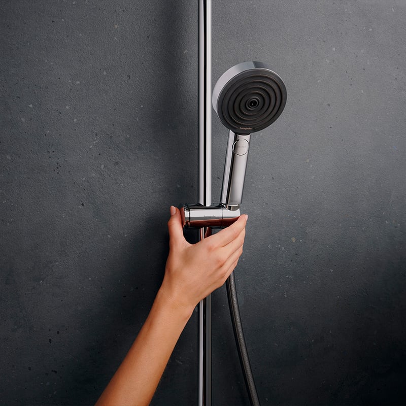 Adjustable handset height of the Hansgrohe Pulsify S Puro Shower Set, in chrome, supplied by Deluxe Bathrooms.
