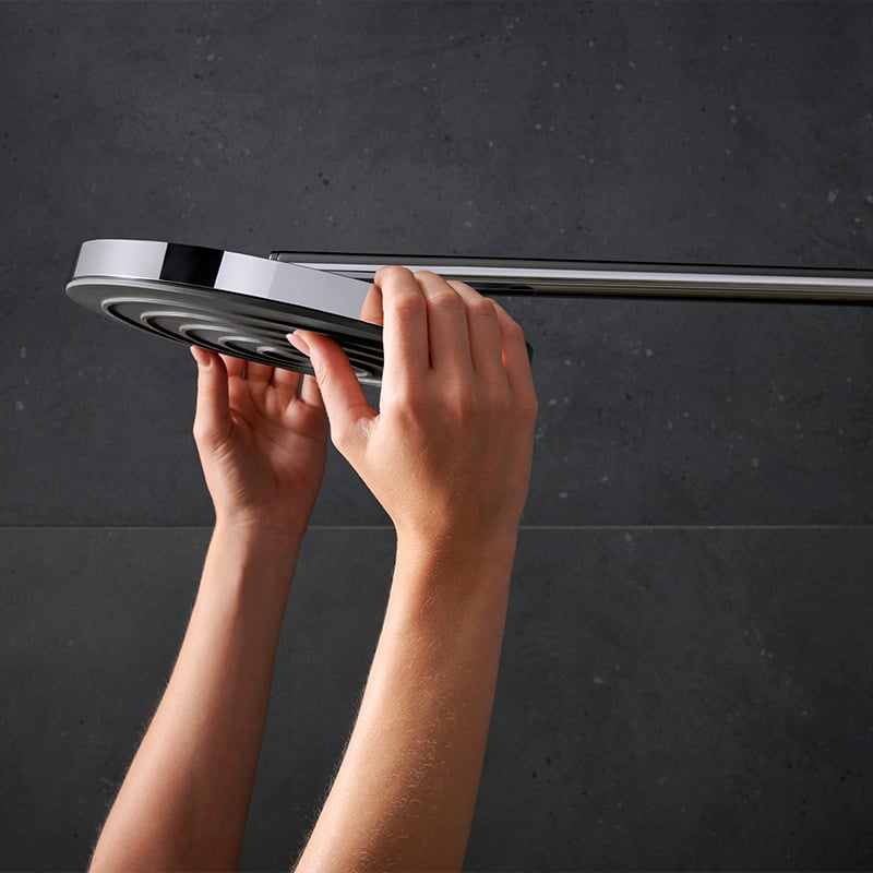Adjustable overhead shower angle of the Hansgrohe Pulsify S Puro Shower Set, in chrome, supplied by Deluxe Bathrooms.