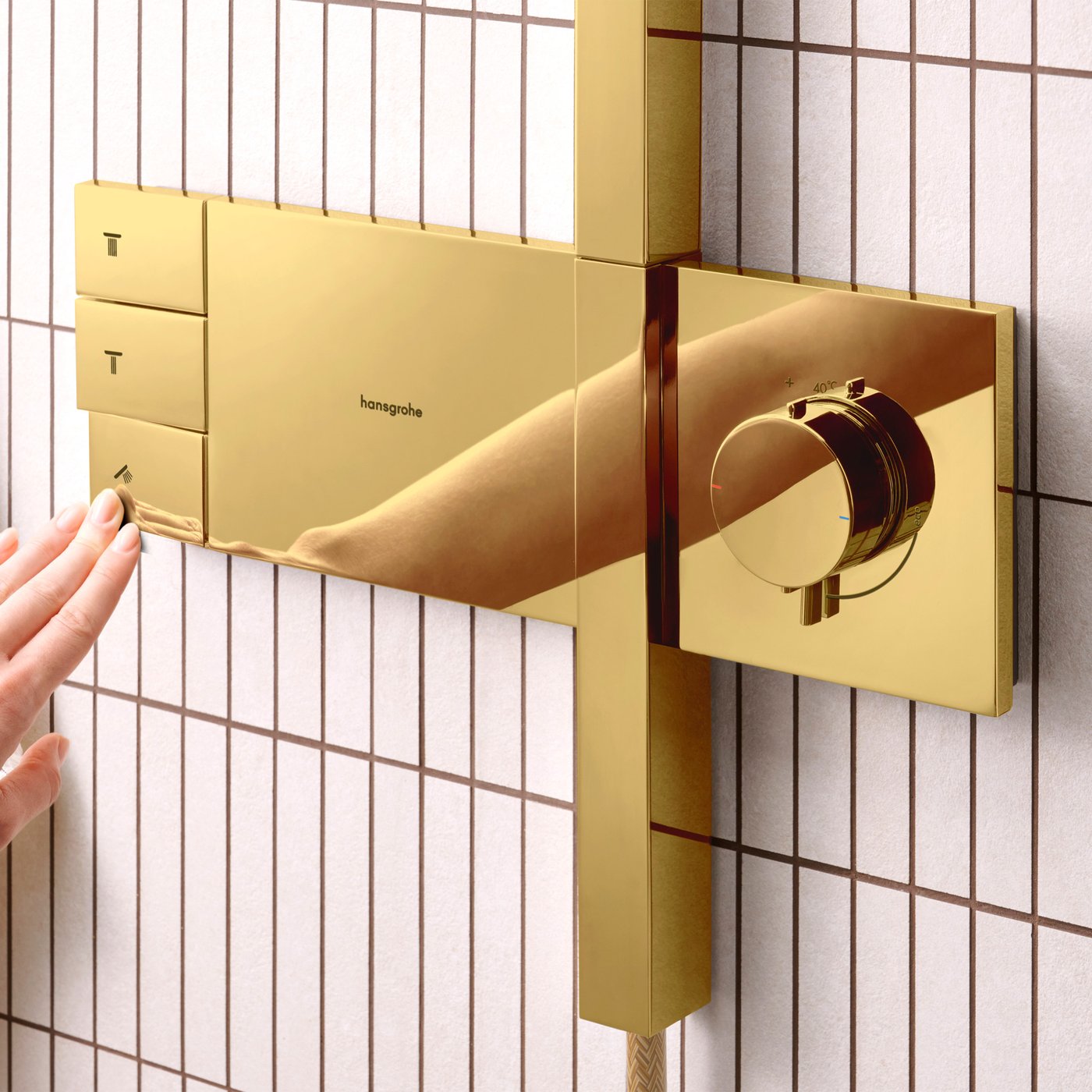 Thermostat and water flow control from the Hansgrohe Raindance Alive Shower system - in polished gold optic finish, supplied by Deluxe Bathrooms.