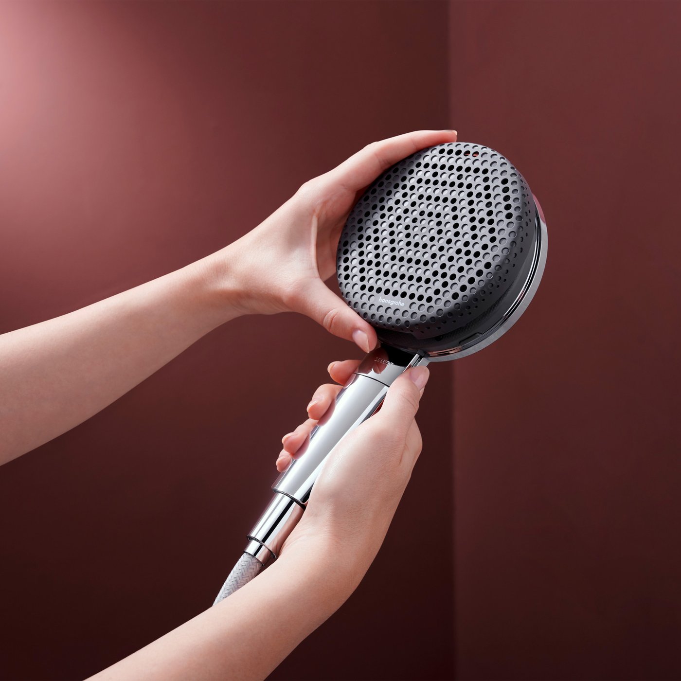 Removing the handset shower cover from the Hansgrohe 300 2jet - in chrome - supplied by Deluxe Bathrooms