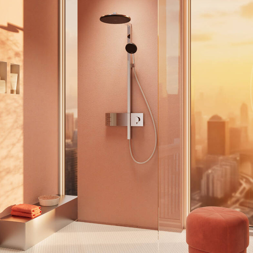 Lifestyle image of the Hangrohe Raindance Alive S Showerpipe 300 2Jet with ShowerSelect Comfort in chrome finish. Supplied by Deluxe Bathrooms.