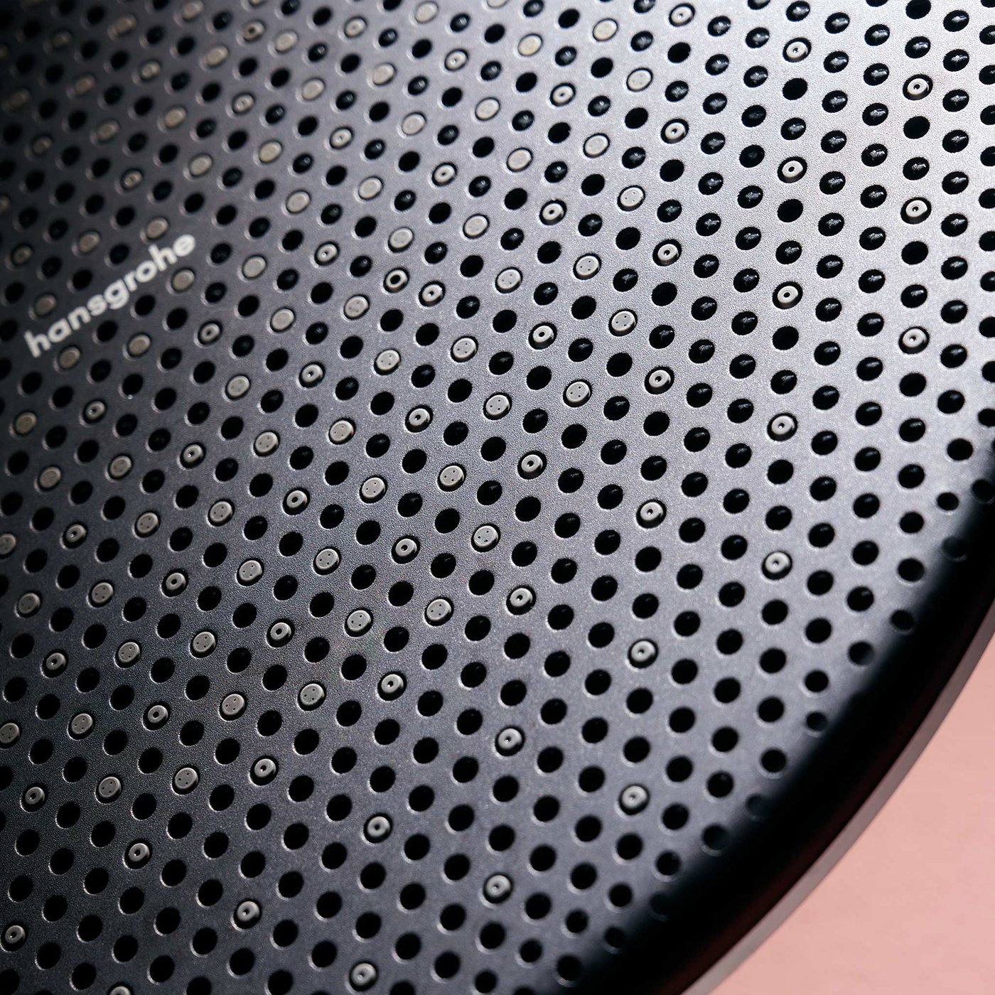 Close up view of a shower head from a Hansgrohe shower system supplied by Deluxe Bathrooms.