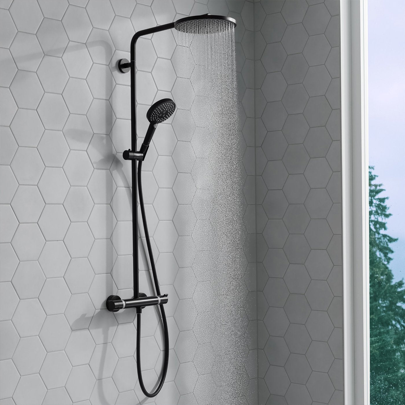 Hansgrohe Raindance Select 1-Jet Shower system with 240mm wide overhead, supplied by Deluxe Bathrooms - in matt black and fitted on a bathroom wall. 