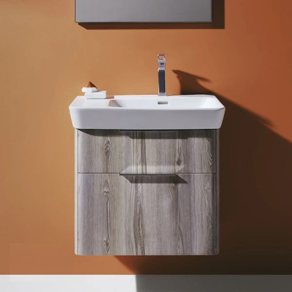 Lifestyle image of the Laufen Moderna wall-hung vanity unit and washbasin in ash colour.