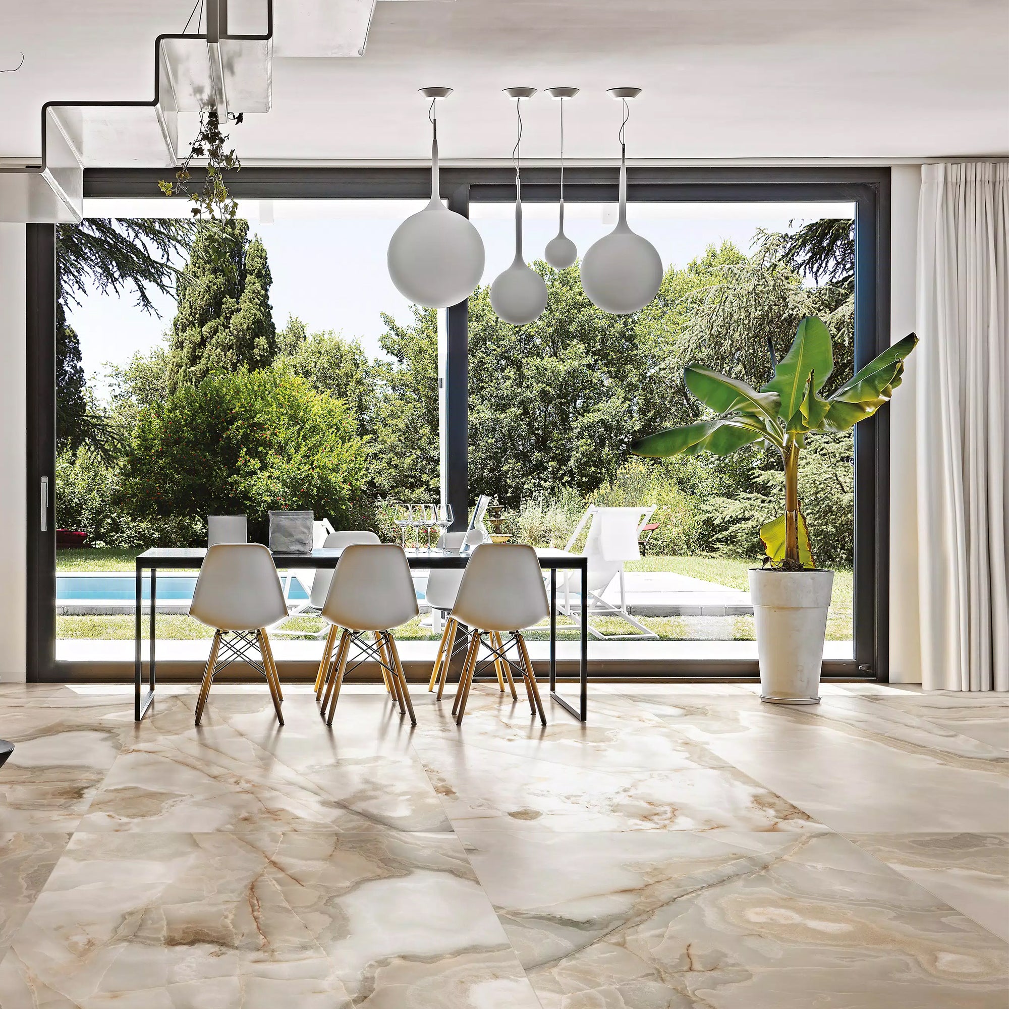 Lifestyle image featuring Rêves Noisette Onyx Effect porcelain gloss tiles, supplied by Deluxe Bathrooms.