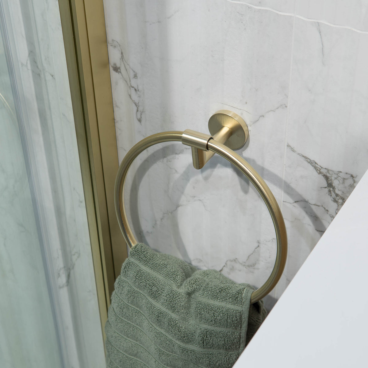 Brushed Brass Towel Ring On at Deluxe Bathrooms Showroom